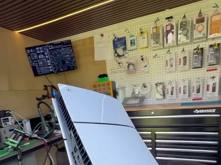 A PlayStation 5 held inside the TEC CENTER van