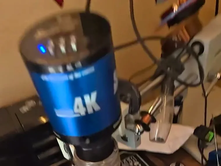 The 4K camera head of the microscope used for board-level work